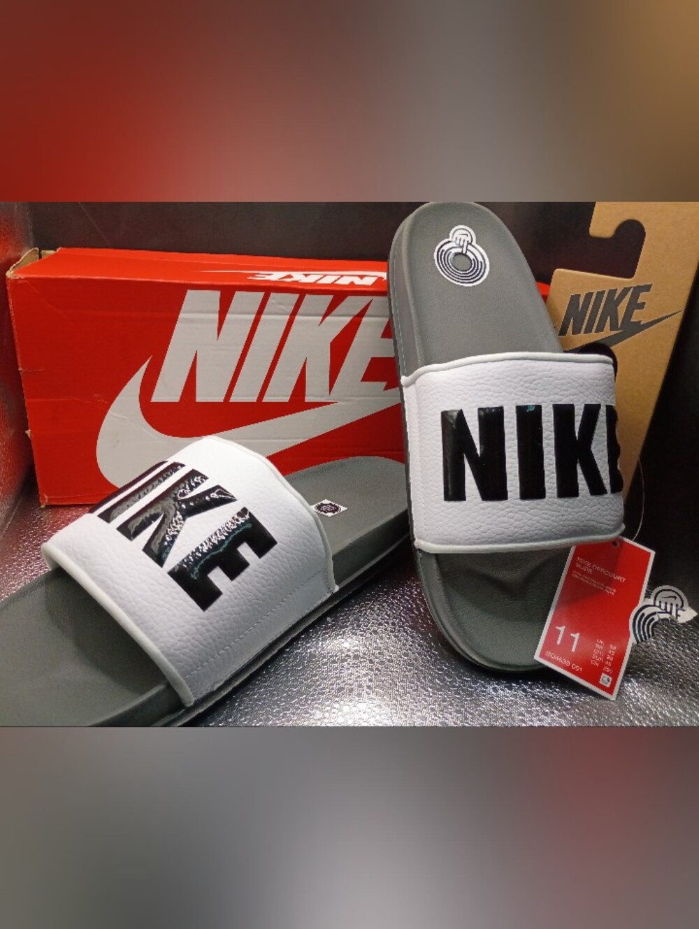 Nike Men’s White and Gray Slide Sandals with Black Logo Block Letters